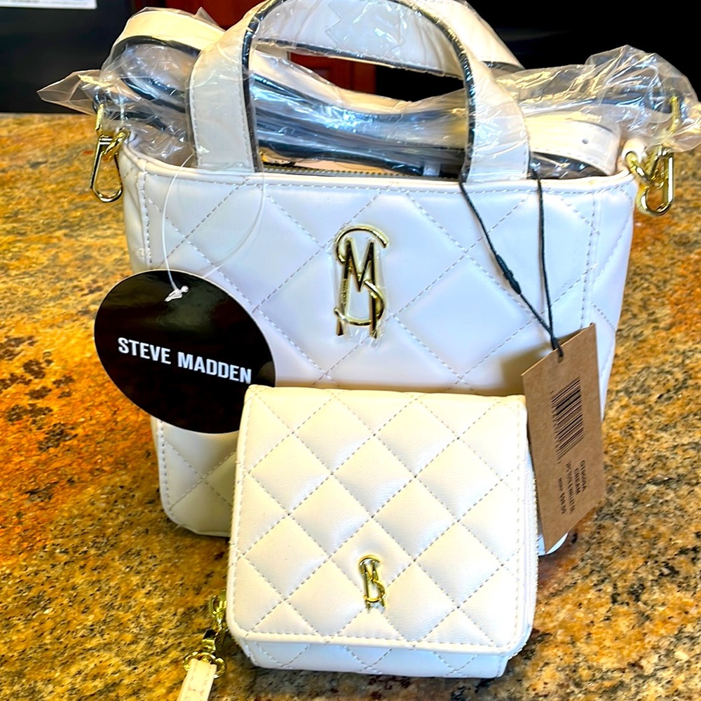 Brand new. Steve Madden 2 pc tote and wallet set.